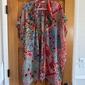 Red, Pink, Orange, Turquoise caftan with colorful tassels. One size.